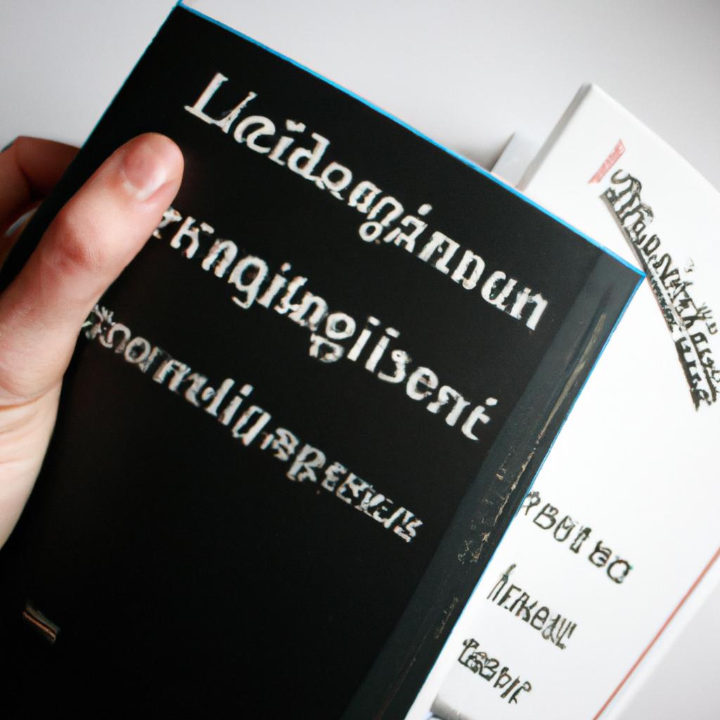 Person holding German reference dictionaries