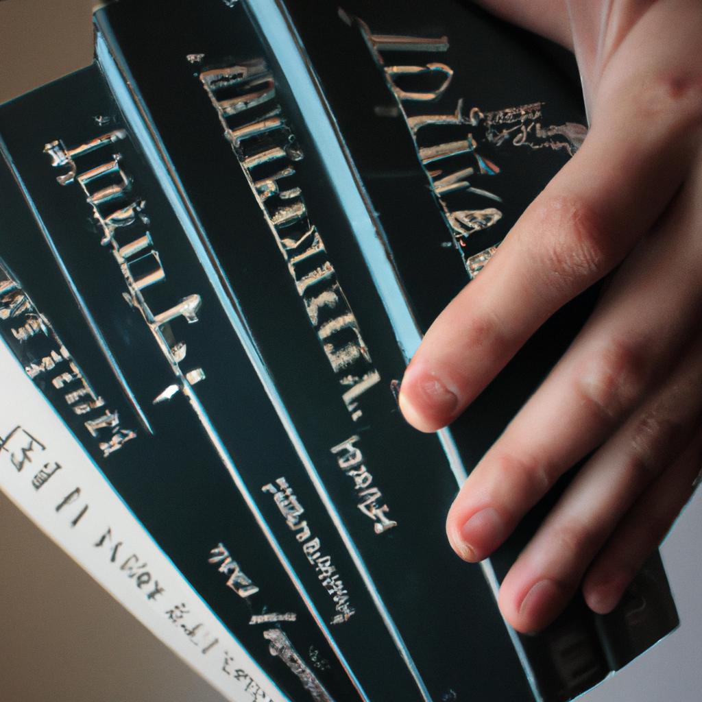 Person holding Italian reference dictionaries