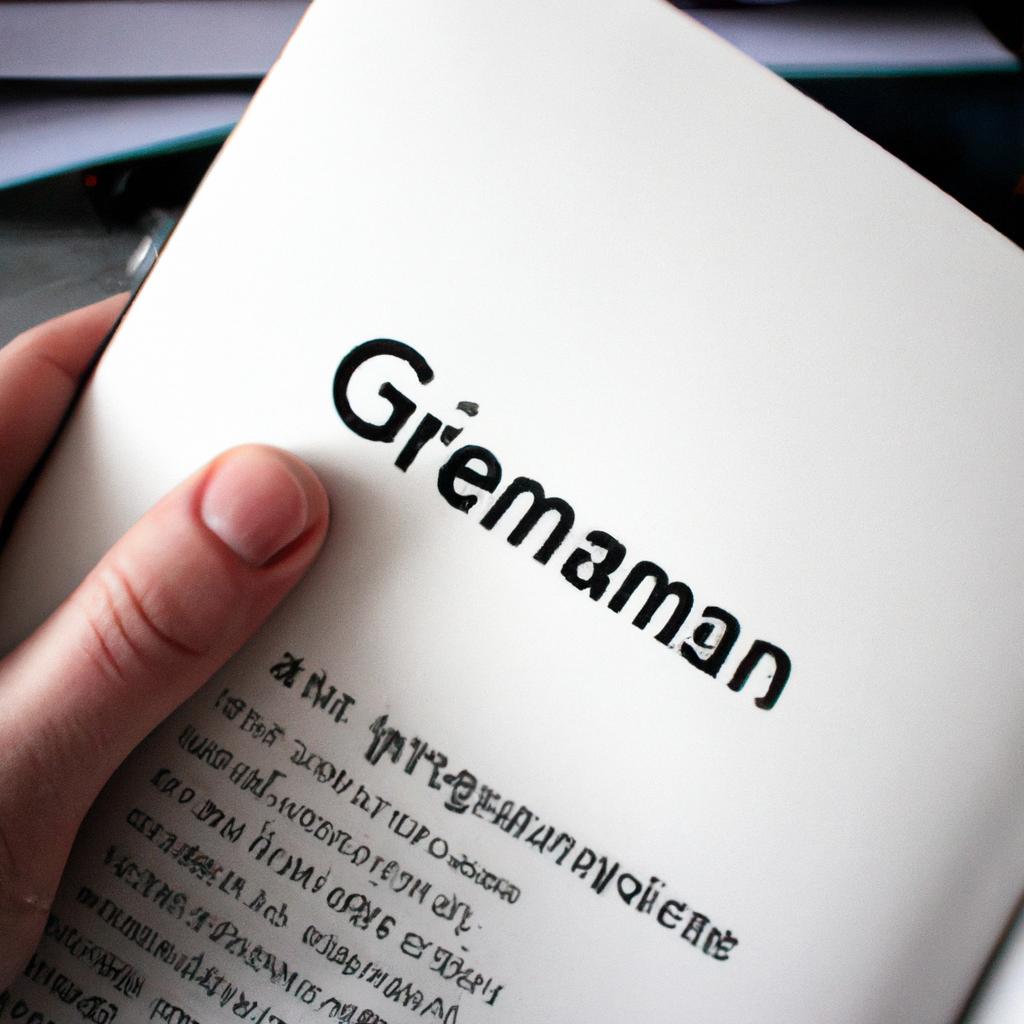 Person holding German grammar book